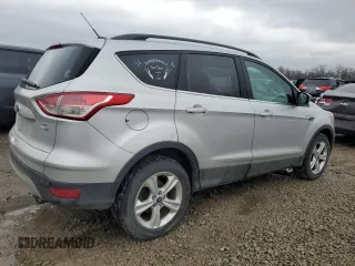 2014 Ford Escape SE with VIN 1FMCU9GX4EUD10298, listed as a Copart auction lot 44260995 with 199,291 mi miles and Clean Title. Bid and sale history available at carsss.com. Image 3.