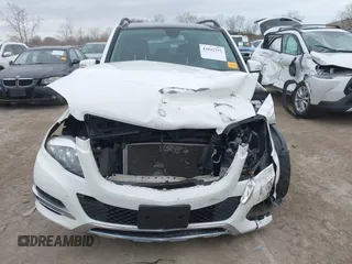 2015 Mercedes-Benz GLK with VIN WDCGG8JB8FG440969, listed as a IAAI auction lot 42042793 with 98,653 mi miles. Bid and sale history available at carsss.com. Image 12.