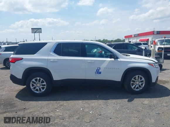 2020 Chevrolet Traverse LS z VIN 1GNERFKW8LJ262886, wystawiony jako IAAI lot #42124771 z przebiegiem 22 357 mil mil oraz . Historia ofert i sprzedaży dostępna na DreamBid. Obrazek 13.