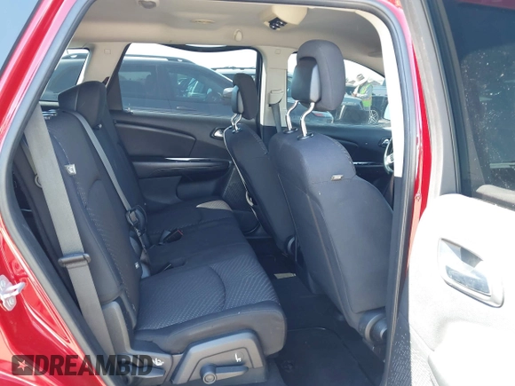 2015 Dodge Journey SE z VIN 3C4PDCAB9FT587668, wystawiony jako IAAI lot #41868556 z przebiegiem 99 695 mil mil oraz . Historia ofert i sprzedaży dostępna na DreamBid. Obrazek 8.