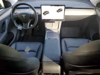 2024 Tesla Model Y Long Range with VIN 7SAYGDEE4RA299503, listed as a Copart auction lot 61950585 with 17,077 mi miles and Salvage title. Bid and sale history available at DreamBid. Image 8.