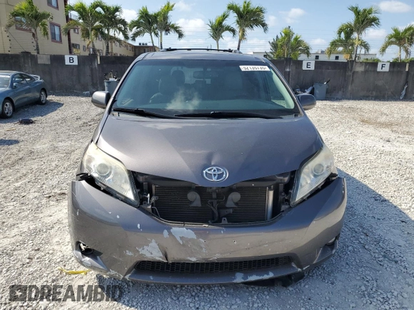 2015 Toyota Sienna XLE with VIN 5TDYK3DCXFS672544, listed as a Copart auction lot 52135735 with 181,780 mi miles and Salvage Title. Bid and sale history available at carsss.com. Image 5.