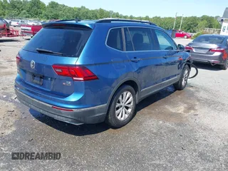 2018 Volkswagen Tiguan SEL with VIN 3VV2B7AX9JM143441, listed as a IAAI auction lot 42351115 with 160,646 mi miles and . Bid and sale history available at DreamBid. Image 4.