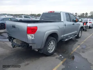 2011 Toyota Tundra 2WD Truck with VIN 5TFRY5F13BX105493, listed as a IAAI auction lot 41340567 with 119,259 mi miles. Bid and sale history available at carsss.com. Image 4.