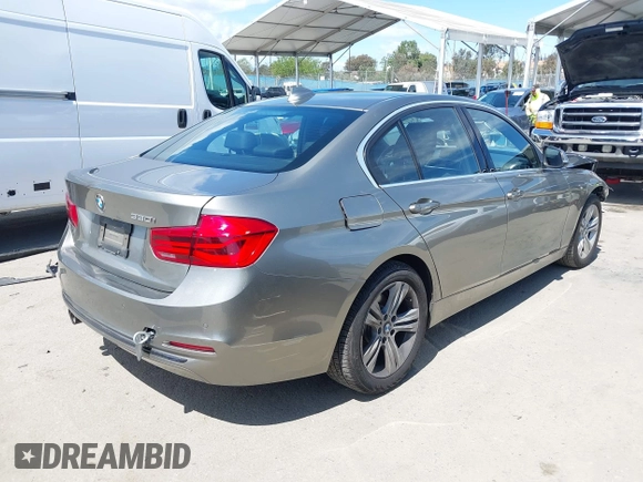 2018 BMW 3 Series 330i with VIN WBA8B9G58JNU98341, listed as a IAAI auction lot 41909777 with 85,396 mi miles and . Bid and sale history available at DreamBid. Image 4.