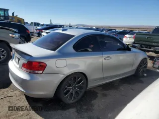 2009 BMW 1 Series 128i with VIN WBAUP93529VF48915, listed as a Copart auction lot 80310034 with 143,208 mi miles and Salvage title. Bid and sale history available at DreamBid. Image 3.