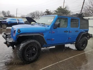 2023 Jeep Wrangler Sport S with VIN 1C4HJXDNXPW543376, listed as a Copart auction lot 86488024 with 35,935 mi miles and Salvage Title. Bid and sale history available at DreamBid. Image 1.