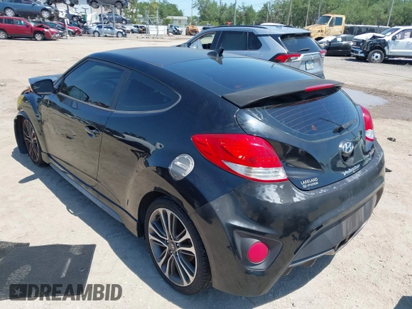 2016 Hyundai Veloster Turbo with VIN KMHTC6AE5GU281597, listed as a IAAI auction lot 42006038 with 77,642 mi miles. Bid and sale history available at carsss.com. Image 3.