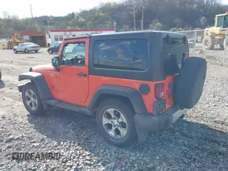 2015 Jeep Wrangler Sport with VIN 1C4AJWAG7FL582721, listed as a IAAI auction lot 41989505 with 102,961 mi miles. Bid and sale history available at carsss.com. Image 3.
