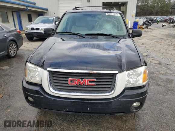 2006 GMC Envoy SLT with VIN 1GKDS13S762258032, listed as a Copart auction lot 88677095 with 184,188 mi miles and Salvage Title. Bid and sale history available at carsss.com. Image 5.