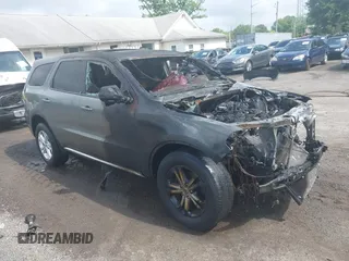 2013 Dodge Durango SXT with VIN 1C4RDJAGXDC527657, listed as a IAAI auction lot 42432643 with Not provided miles and . Bid and sale history available at DreamBid. Image 1.