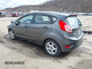 2015 Ford Fiesta SE with VIN 3FADP4EJ0FM117739, listed as a IAAI auction lot 41795558 with 111,000 mi miles. Bid and sale history available at carsss.com. Image 3.