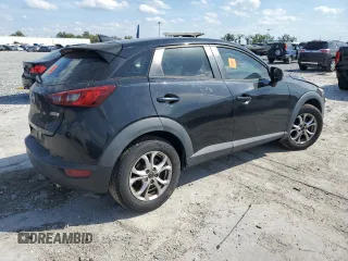 2016 Mazda CX-3 Touring with VIN JM1DKBC7XG0121516, listed as a Copart auction lot 48632965 with 119,449 mi miles and Salvage Title. Bid and sale history available at carsss.com. Image 3.
