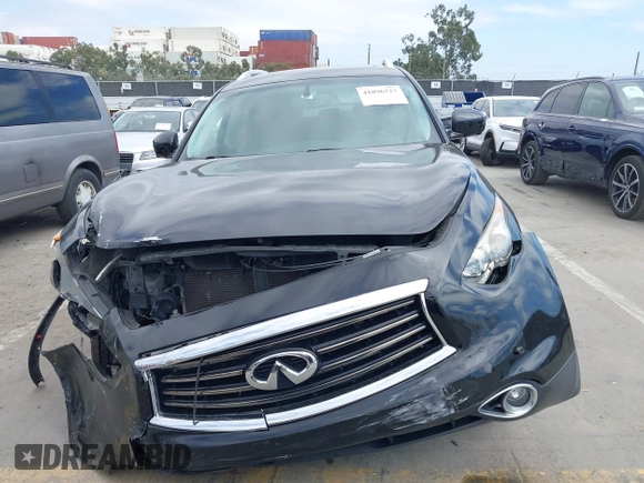 2014 Infiniti QX70 z VIN JN8CS1MW6EM410091, wystawiony jako IAAI lot #41896327 z przebiegiem 139 021 mil mil oraz . Historia ofert i sprzedaży dostępna na DreamBid. Obrazek 12.