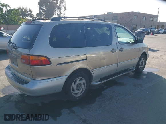 2000 Toyota Sienna LE with VIN 4T3ZF13C9YU189305, listed as a IAAI auction lot 42201168 with 218,254 mi miles and . Bid and sale history available at DreamBid. Image 4.