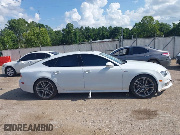 2016 Audi A7 Premium Plus with VIN WAUWGAFC2GN021696, listed as a IAAI auction lot 42595234 with 112,464 mi miles and . Bid and sale history available at DreamBid. Image 13.