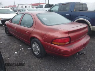 2000 Dodge Stratus with VIN 1B3EJ46XXYN136487, listed as a IAAI auction lot 41313450 with 127,584 mi miles and . Bid and sale history available at DreamBid. Image 3.