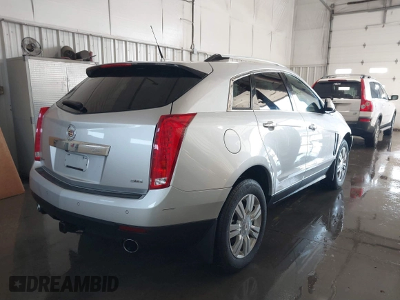 2013 Cadillac SRX Luxury Collection with VIN 3GYFNCE3XDS652987, listed as a IAAI auction lot 40955236 with 119,517 mi miles. Bid and sale history available at carsss.com. Image 4.