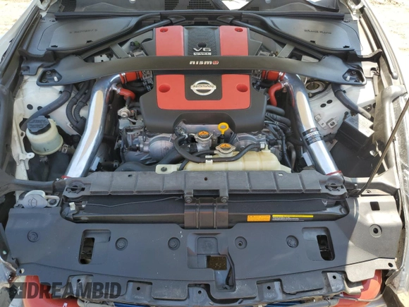 2015 Nissan 370Z Nismo z VIN JN1AZ4EH3FM441254, wystawiony jako Copart lot #52646145 z przebiegiem 74 303 mil mil oraz Szkoda całkowita • Salvage title. Historia ofert i sprzedaży dostępna na DreamBid. Obrazek 11.