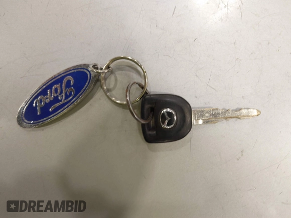 2004 Mazda 3 i with VIN JM1BK12F841139173, listed as a IAAI auction lot 40841392 with 264,821 mi miles and . Bid and sale history available at DreamBid. Image 11.