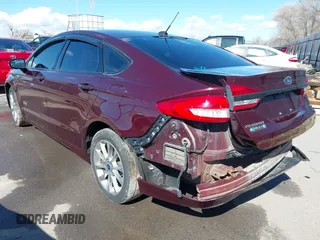 2017 Ford Fusion Energi SE with VIN 3FA6P0PU5HR274892, listed as a IAAI auction lot 41823526 with 188,746 mi miles. Bid and sale history available at carsss.com. Image 3.