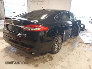 2017 Ford Fusion Titanium с VIN 3FA6P0SU8HR215570, выставлен на аукционе IAAI как лот 41427407 с пробегом 97 281 миль миль и . История ставок и продаж доступна на DreamBid. Изображение 4.