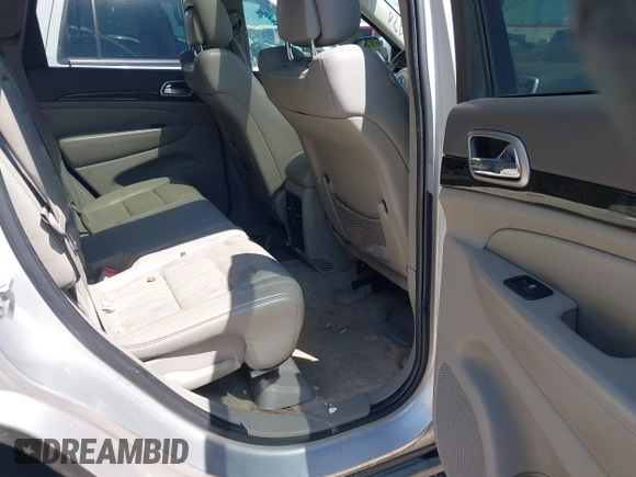 2012 Jeep Grand Cherokee Laredo with VIN 1C4RJEAG4CC167557, listed as a IAAI auction lot 42047720 with 195,631 mi miles. Bid and sale history available at carsss.com. Image 8.