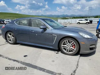 2010 Porsche Panamera Turbo with VIN WP0AC2A70AL090897, listed as a Copart auction lot 60986335 with 120,334 mi miles and Salvage title. Bid and sale history available at DreamBid. Image 4.