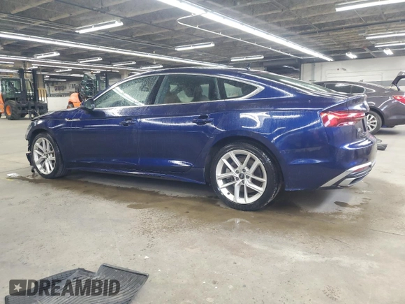 2023 Audi A5 Sportback S line Premium z VIN WAUDACF50PA054600, wystawiony jako Copart lot #56216885 z przebiegiem 23 802 mil mil oraz Szkoda całkowita • Salvage title. Historia ofert i sprzedaży dostępna na DreamBid. Obrazek 2.