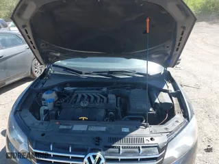 2013 Volkswagen Passat SEL Premium with VIN 1VWCM7A34DC055684, listed as a IAAI auction lot 42039636 with 167,746 mi miles. Bid and sale history available at carsss.com. Image 10.