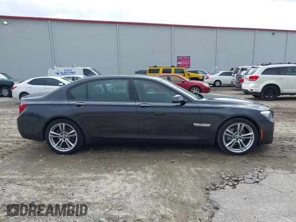 2014 BMW 7 Series 740Li with VIN WBAYE4C56ED138397, listed as a IAAI auction lot 41726117 with 116,291 mi miles. Bid and sale history available at carsss.com. Image 13.