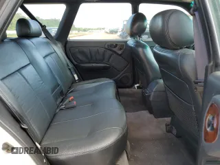 1999 Subaru Legacy Outback with VIN 4S3BG6850X7649578, listed as a Copart auction lot 56654155 with 174,651 mi miles and Salvage title. Bid and sale history available at DreamBid. Image 11.