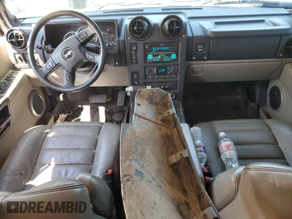 2005 Hummer H2 SUV with VIN 5GRGN23U95H101796, listed as a Copart auction lot 76991574 with 88,204 mi miles and Salvage Title. Bid and sale history available at carsss.com. Image 8.