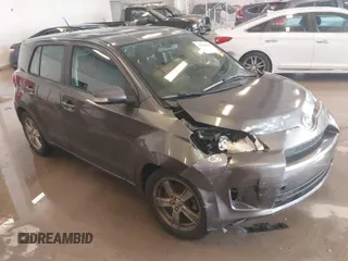 2009 Scion xD with VIN JTKKU104X9J042858, listed as a IAAI auction lot 41616334 with 170,130 mi miles. Bid and sale history available at carsss.com. Image 1.