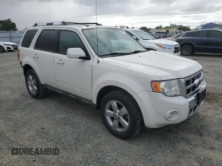 2010 Ford Escape Limited with VIN 1FMCU0E74AKC89196, listed as a Copart auction lot 50990585 with 144,830 mi miles and Salvage title. Bid and sale history available at DreamBid. Image 4.