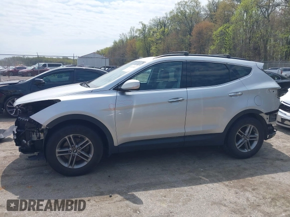 2017 Hyundai Santa Fe 2.4L z VIN 5XYZUDLB6HG400828, wystawiony jako IAAI lot #42013903 z przebiegiem 88 573 mil mil oraz . Historia ofert i sprzedaży dostępna na DreamBid. Obrazek 15.