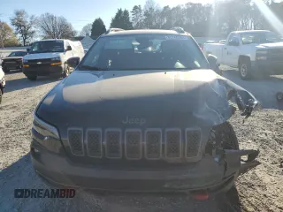 2022 Jeep Cherokee Trailhawk with VIN 1C4PJMBX5ND549237, listed as a Copart auction lot 83760264 with 24,756 mi miles and Salvage Title. Bid and sale history available at carsss.com. Image 5.