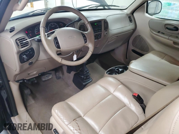 2002 Ford F-150 XL with VIN 1FTRX18L62NA69837, listed as a Copart auction lot 61581935 with 130,078 mi miles and Salvage title. Bid and sale history available at DreamBid. Image 8.