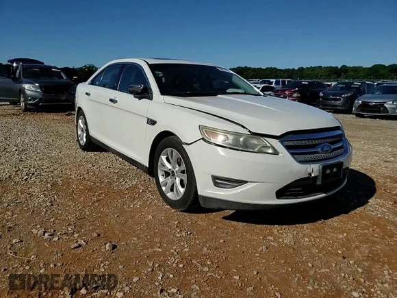 2011 Ford Taurus SEL z VIN 1FAHP2EW2BG188513, wystawiony jako Copart lot #58017755 z przebiegiem 211 530 mil mil oraz Szkoda całkowita • Salvage title. Historia ofert i sprzedaży dostępna na DreamBid. Obrazek 13.