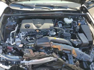 2025 Toyota Camry LE z VIN 4T1DAACK8SU101697, wystawiony jako Copart lot #47858965 z przebiegiem 8 897 mil mil oraz Szkoda całkowita • Salvage title. Historia ofert i sprzedaży dostępna na DreamBid. Obrazek 11.
