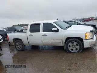 2009 Chevrolet Silverado 1500 with VIN 3GCEC33J29G211535, listed as a IAAI auction lot 41432158 with 171,800 mi miles and . Bid and sale history available at DreamBid. Image 13.