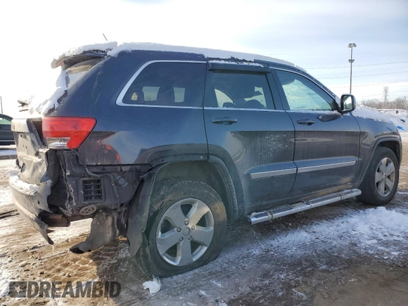 2012 Jeep Grand Cherokee Laredo with VIN 1C4RJFAG9CC340706, listed as a Copart auction lot 45512045 with 244,664 mi miles and Salvage Title. Bid and sale history available at carsss.com. Image 3.