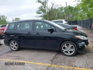 2010 Mazda 5 Sport with VIN JM1CR2W33A0360848, listed as a IAAI auction lot 42104824 with 151,084 mi miles and . Bid and sale history available at DreamBid. Image 14.
