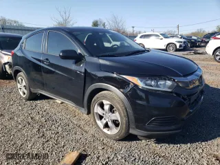2019 Honda HR-V LX with VIN 3CZRU6H3XKG732660, listed as a Copart auction lot 52476615 with 284,189 mi miles and Clean Title. Bid and sale history available at carsss.com. Image 4.