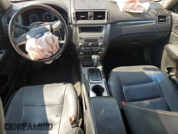 2012 Ford Fusion SEL with VIN 3FAHP0JA1CR348647, listed as a Copart auction lot 61761545 with 65,456 mi miles and Salvage title. Bid and sale history available at DreamBid. Image 8.
