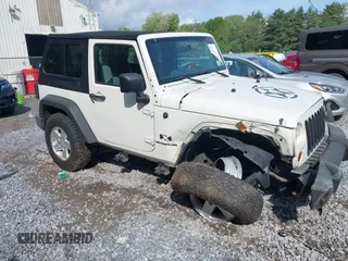 2009 Jeep Wrangler X with VIN 1J4FA24119L727658, listed as a IAAI auction lot 42372855 with 145,450 mi miles and . Bid and sale history available at DreamBid. Image 1.