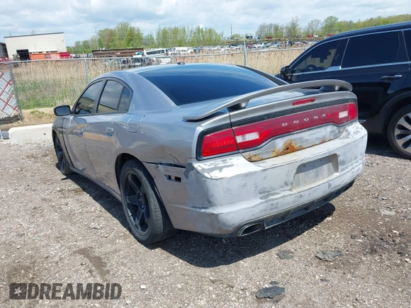 2013 Dodge Charger RT with VIN 2C3CDXCT4DH604611, listed as a IAAI auction lot 42196201 with 211,873 mi miles and . Bid and sale history available at carsss.com. Image 3.