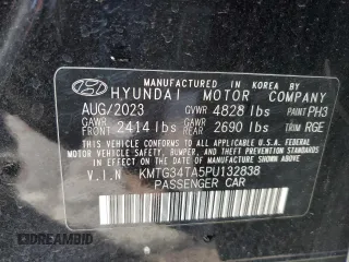 2023 Genesis G70 2.0T with VIN KMTG34TA5PU132838, listed as a Copart auction lot 85335444 with 5,970 mi miles and Salvage Title. Bid and sale history available at DreamBid. Image 13.