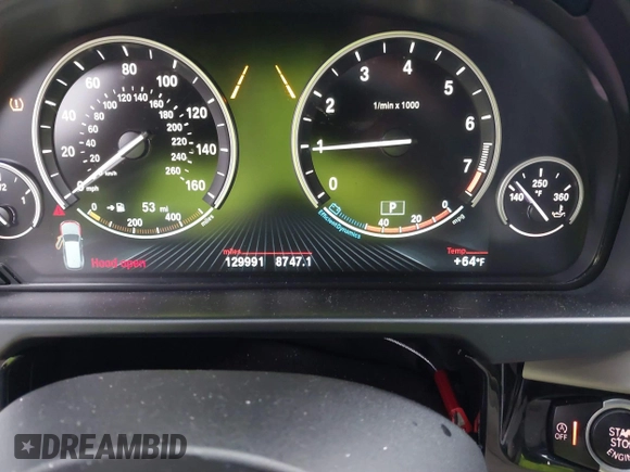 2014 BMW X5 xDrive35i with VIN 5UXKR0C56E0H18800, listed as a IAAI auction lot 40843200 with 129,991 mi miles. Bid and sale history available at carsss.com. Image 7.