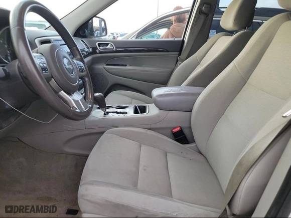 2011 Jeep Grand Cherokee Laredo with VIN 1J4RR4GG1BC669834, listed as a IAAI auction lot 42019804 with 173,943 mi miles. Bid and sale history available at carsss.com. Image 5.